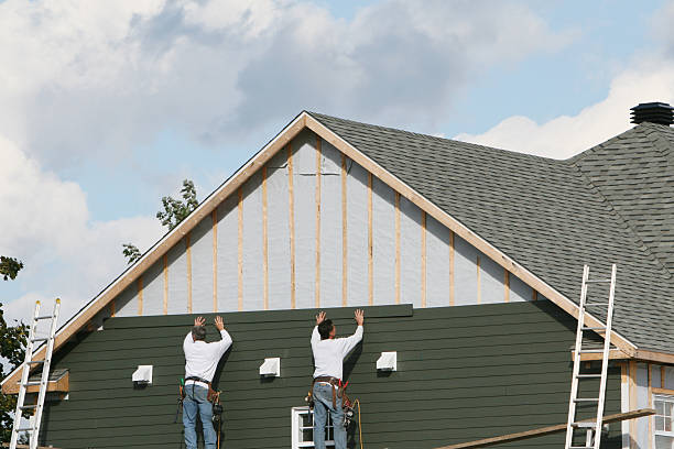 Professional Siding Installation technician working in Newtown, VA